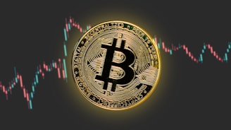 a bitcoin is shown in front of a stock chart