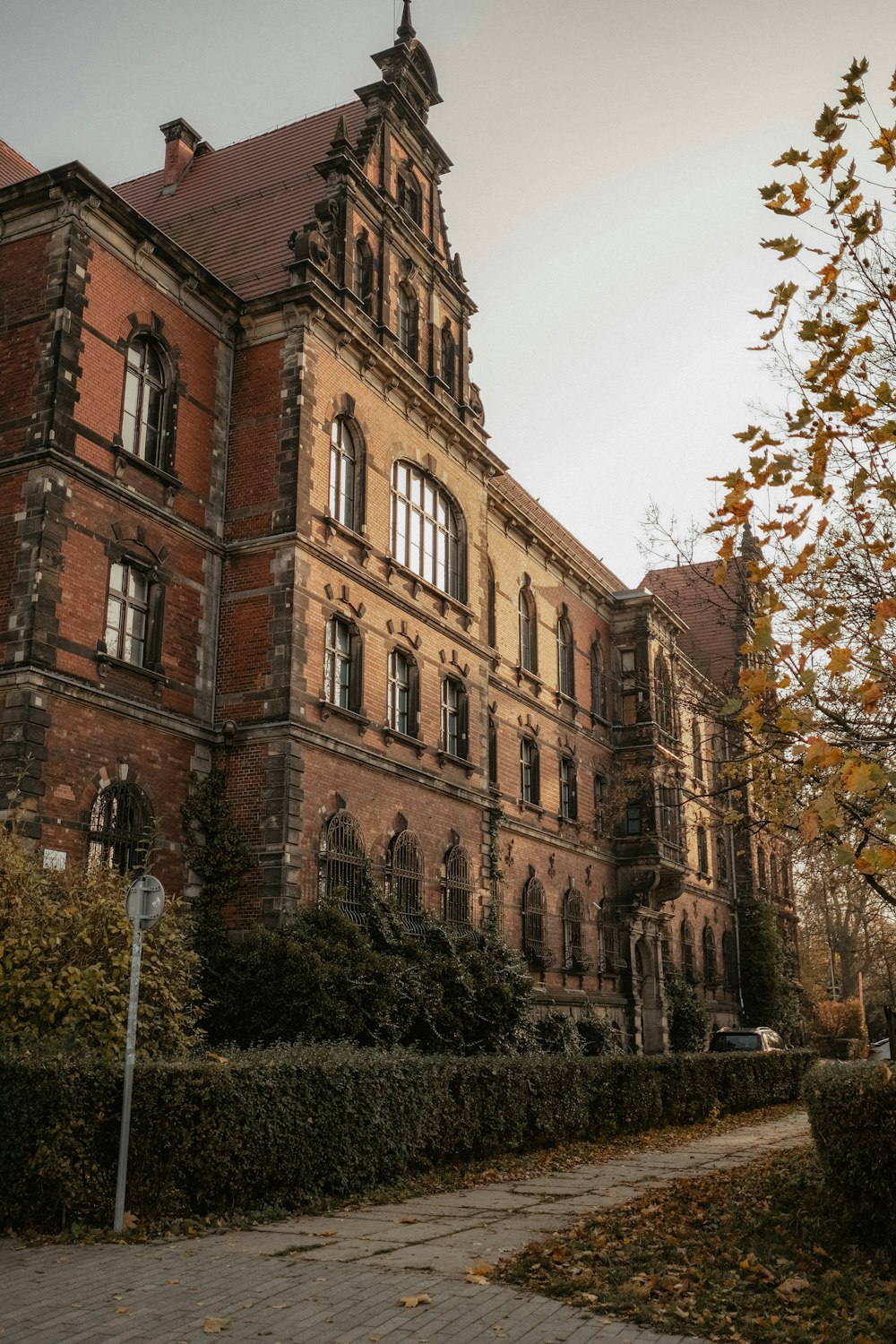 a large brick building with a clock tower