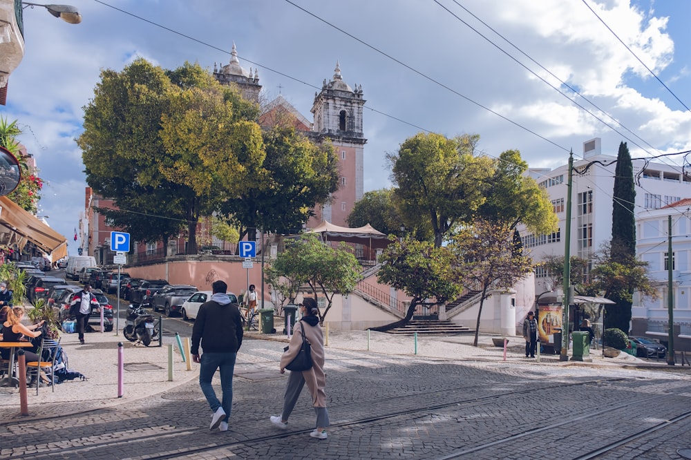 a group of people walking down the street