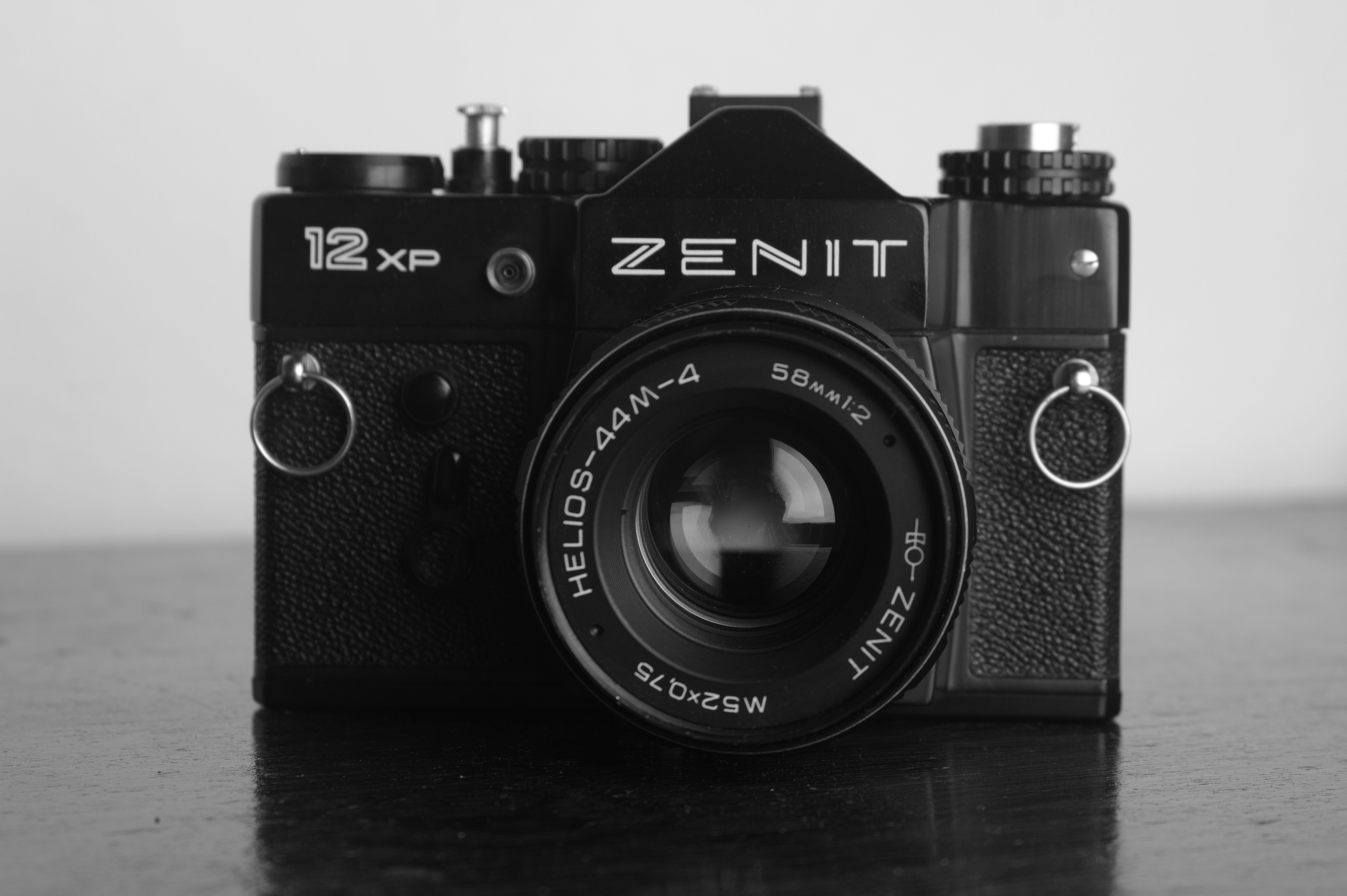 a black and white photo of a camera