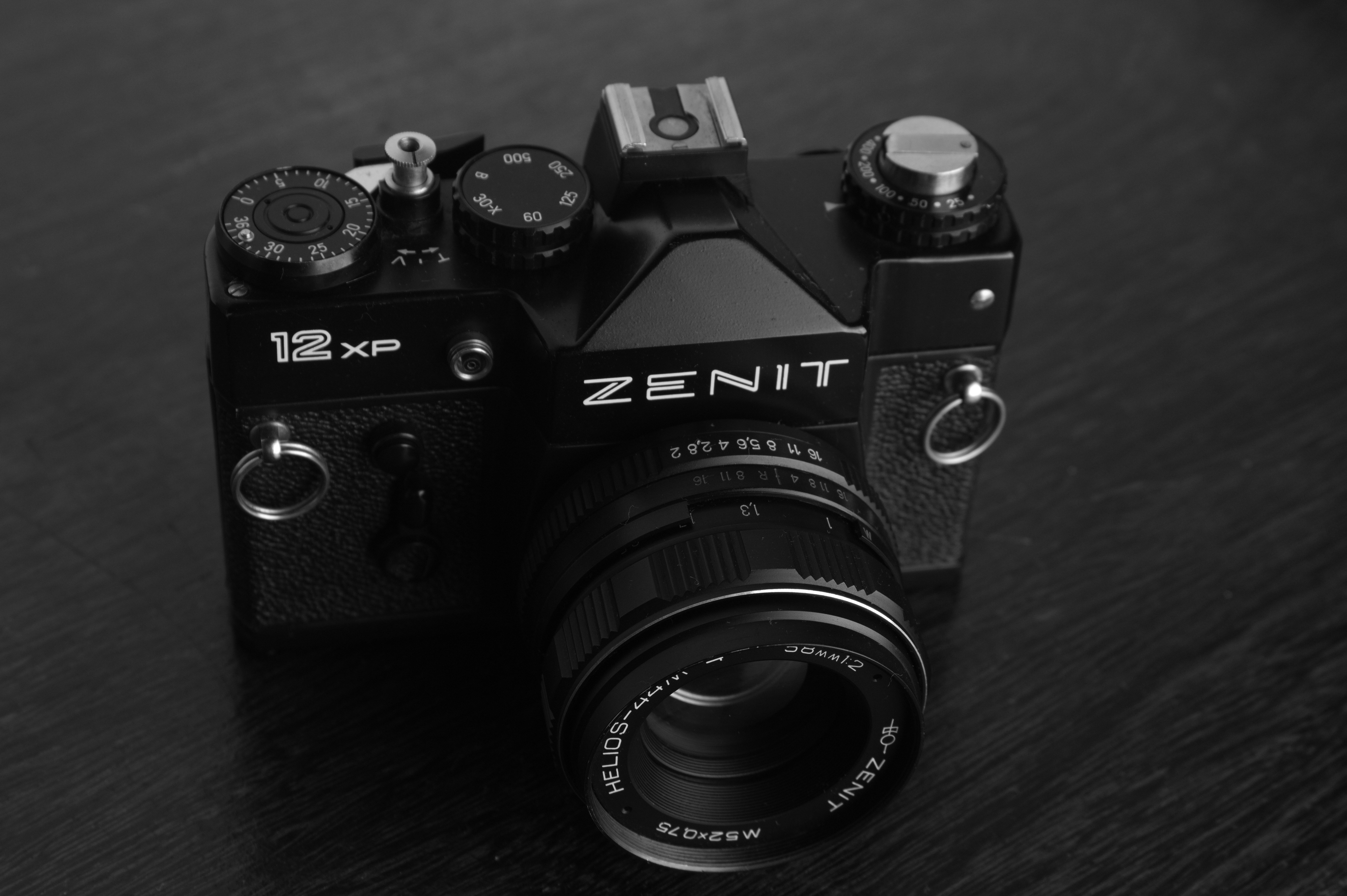 a black and white photo of a camera