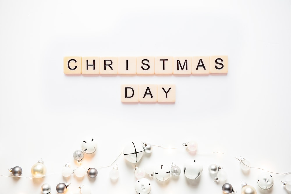 scrabble letters spelling out the word christmas day