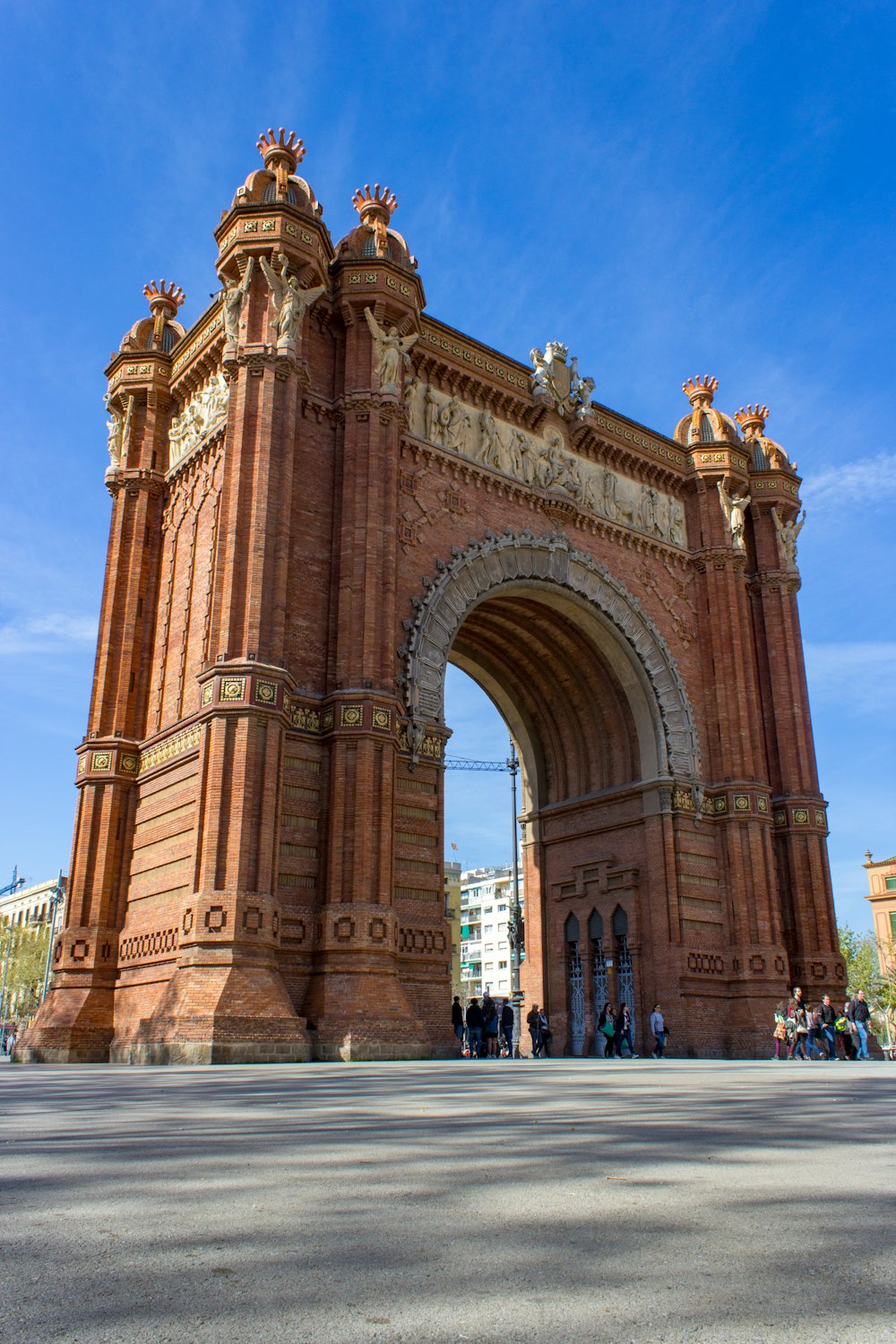 a large brick arch on the side of a road