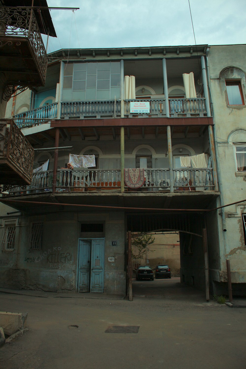 an old building with balconies and balconies on the balconies