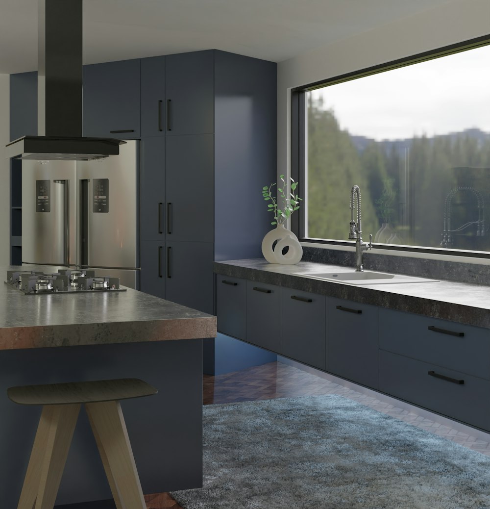 a kitchen with a large window and a sink
