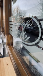 Cozy café interior with warm seasonal decorations reflecting the four seasons.