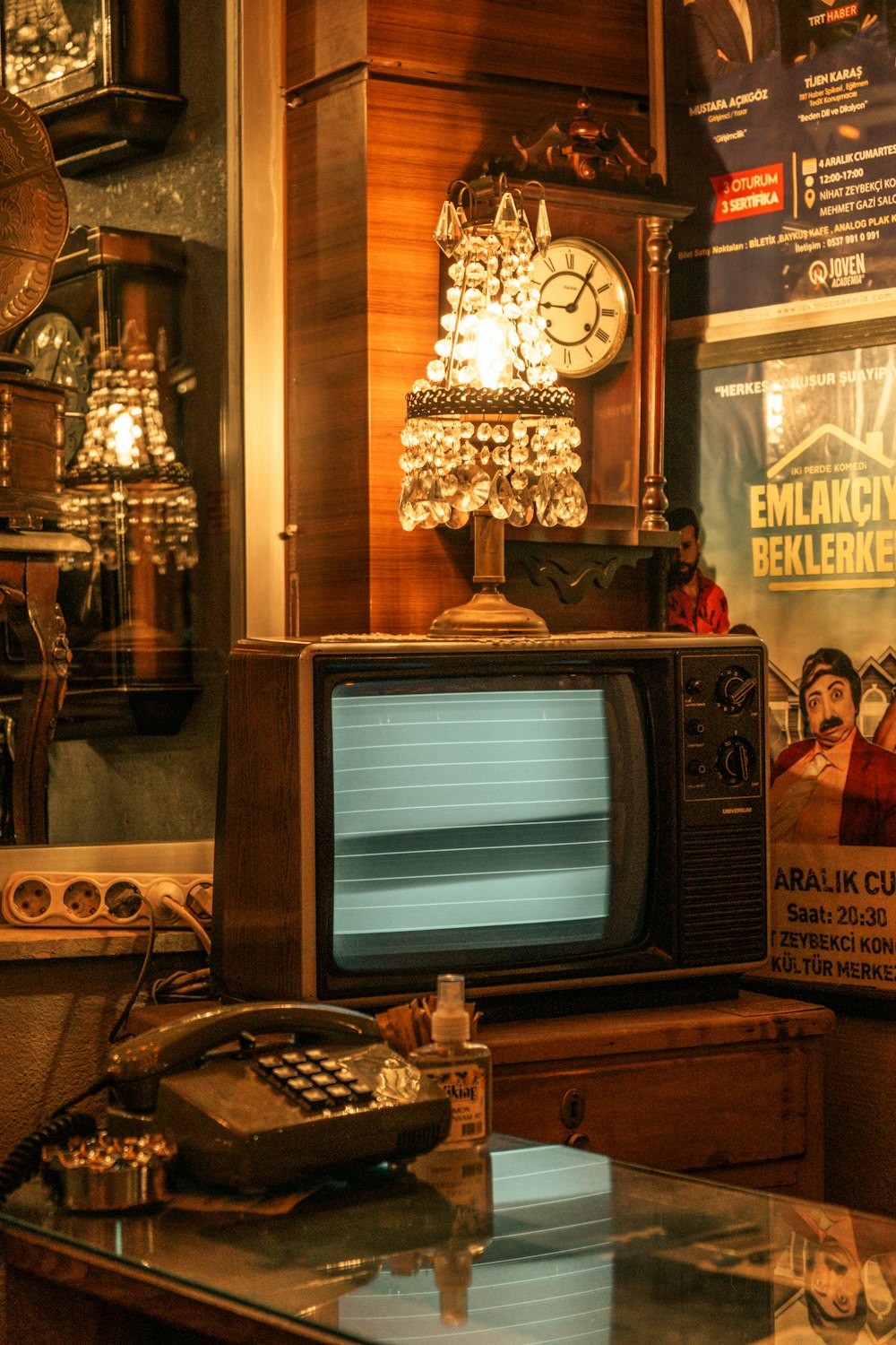 an old fashioned tv sitting on top of a table