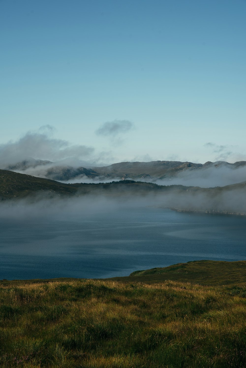 a large body of water surrounded by mountains