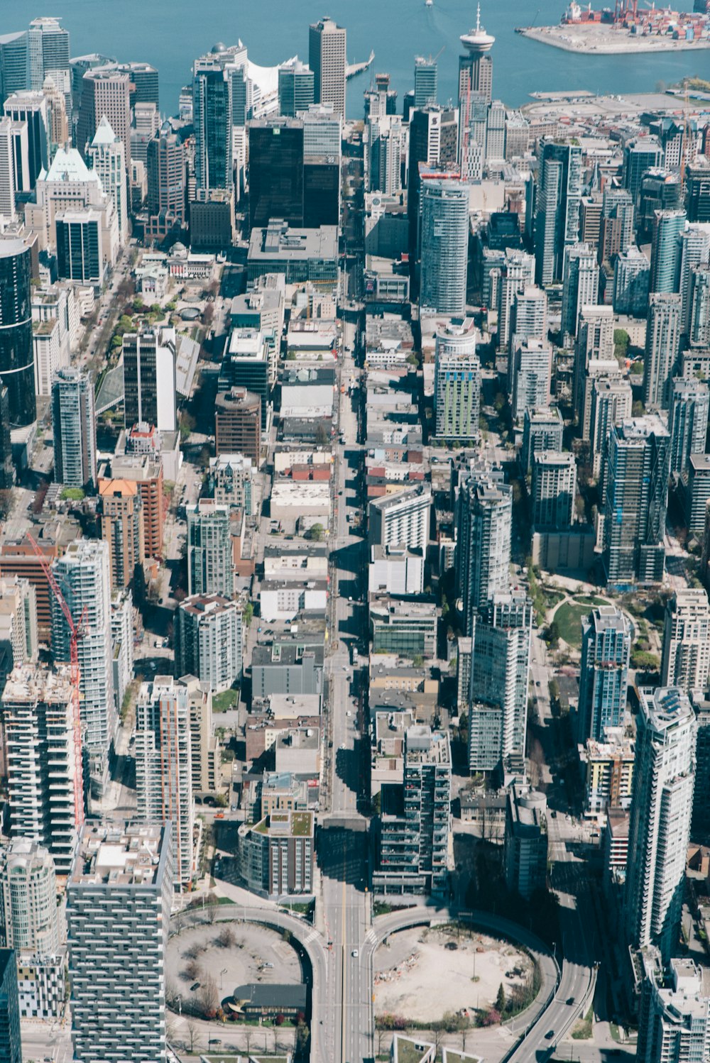 an aerial view of a large city with lots of tall buildings