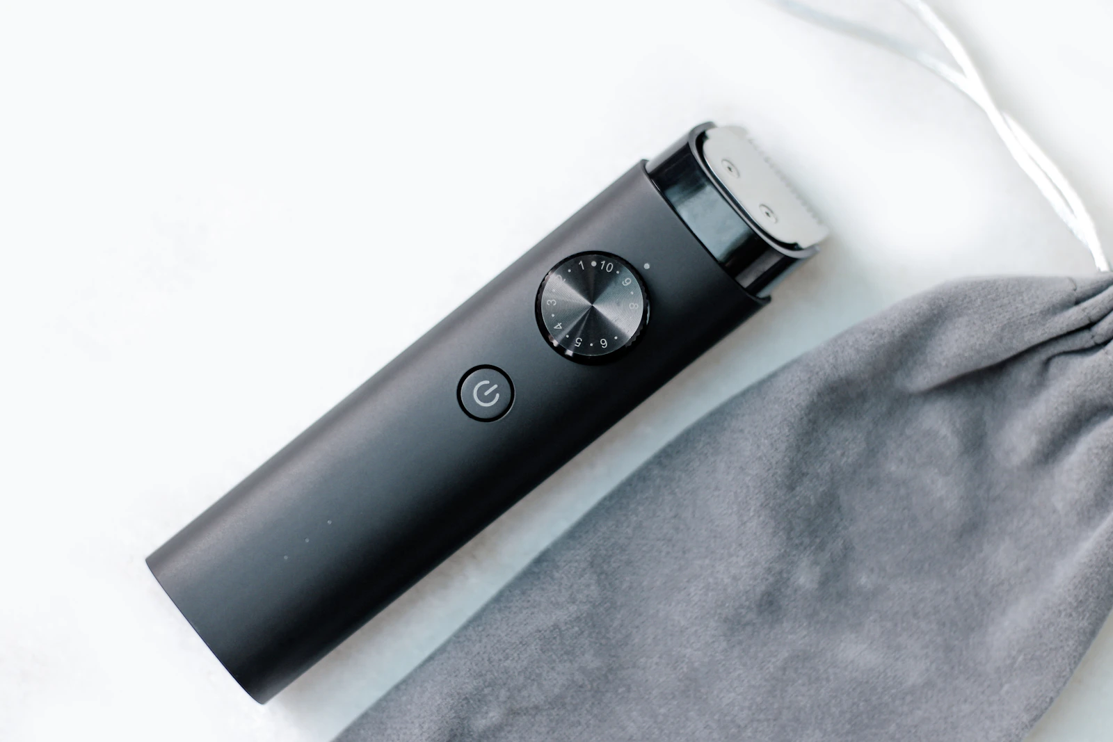 Black cordless trimmer on cloth