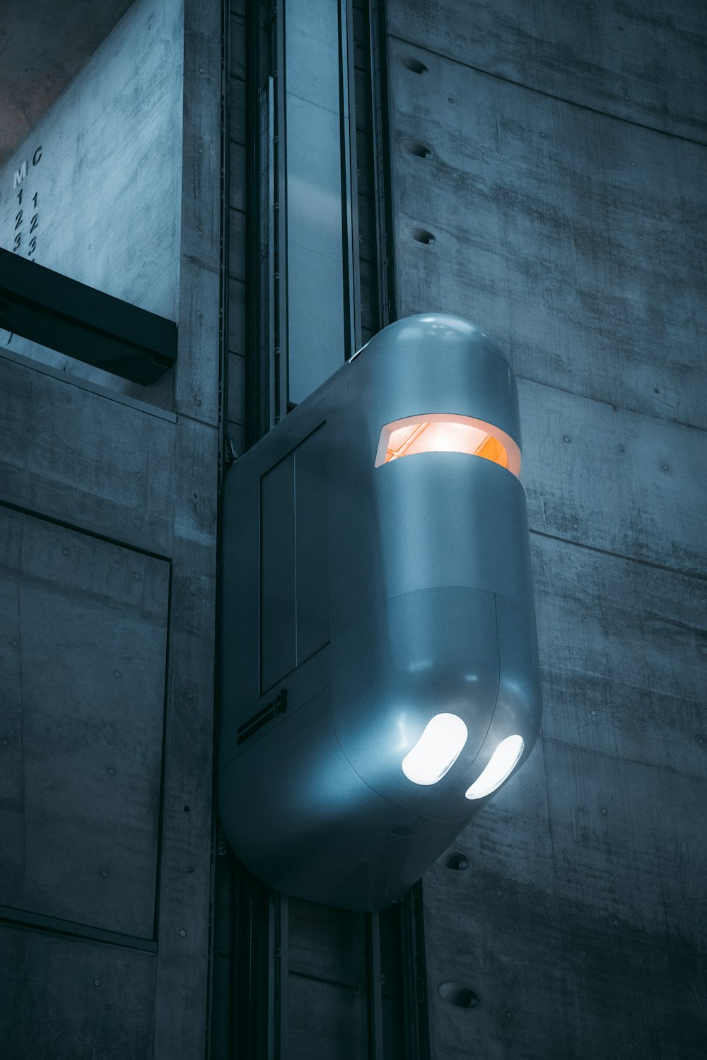 a close up of a street light on a building