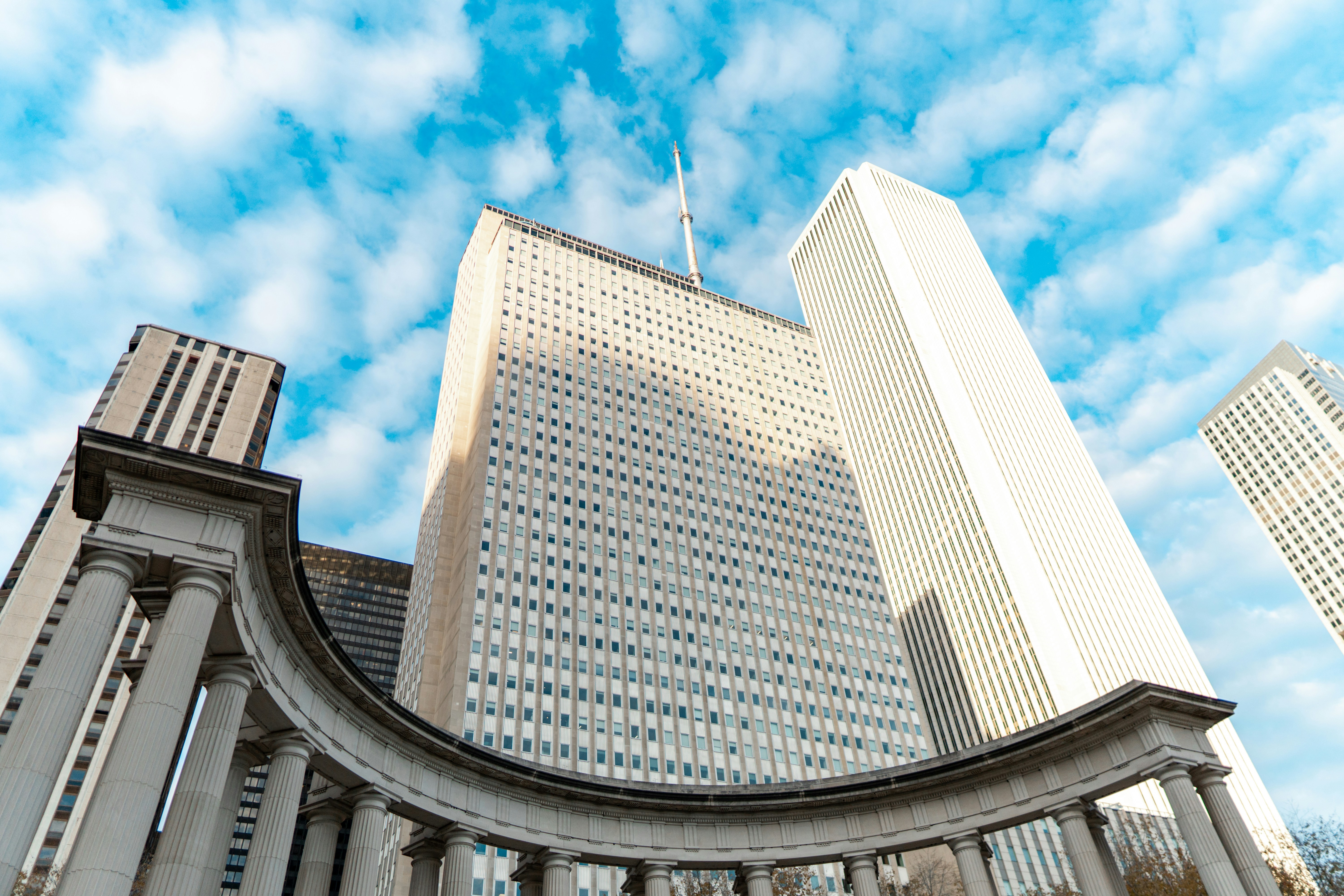 a group of tall buildings sitting next to each other