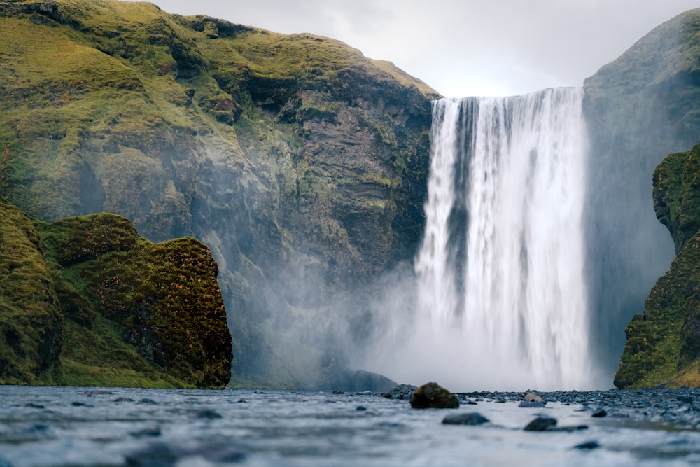 a large waterfall with a large amount of water coming out of it