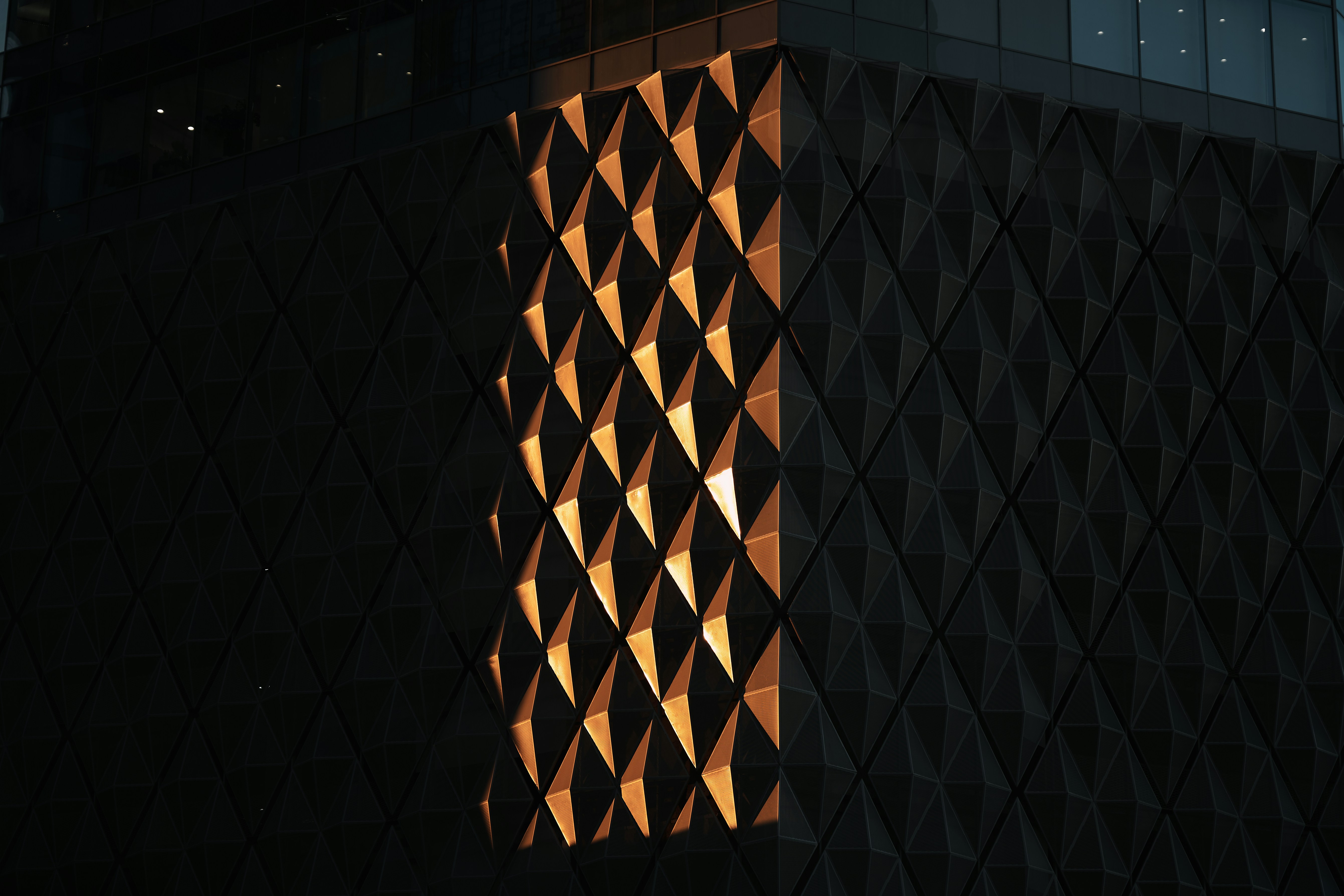 a close up of a building with a light shining on it
