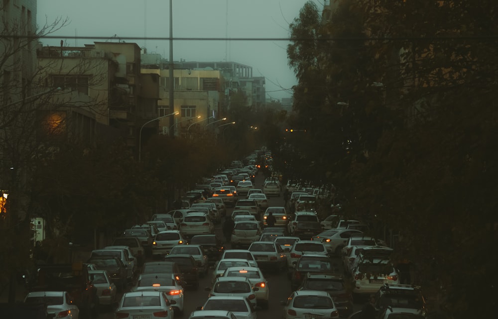 a city street filled with lots of traffic