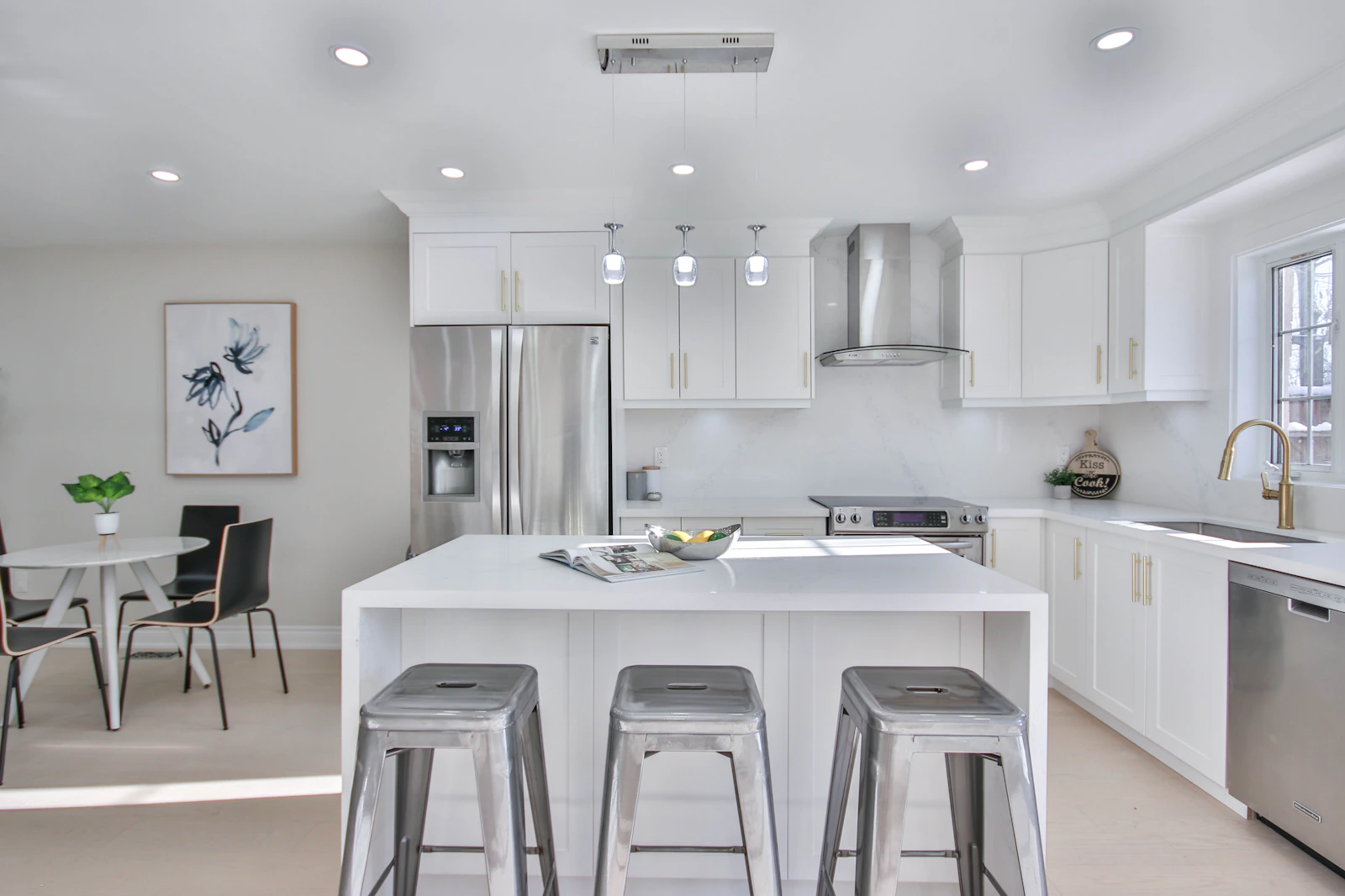 Complete luxury kitchen renovation with island and modern finishes