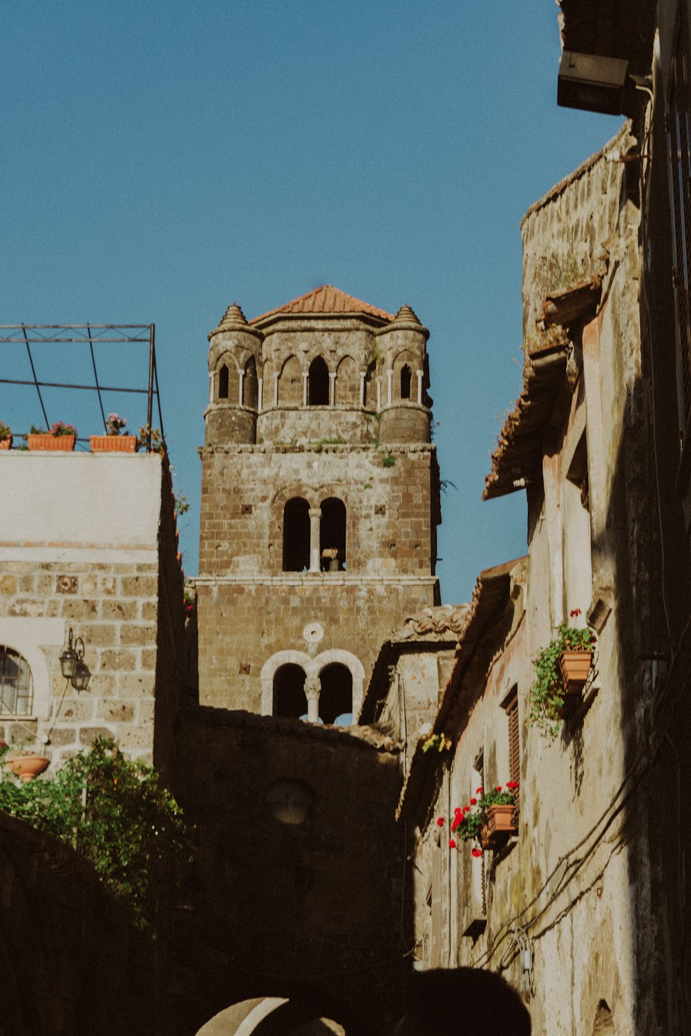 an old building with a clock tower in the background