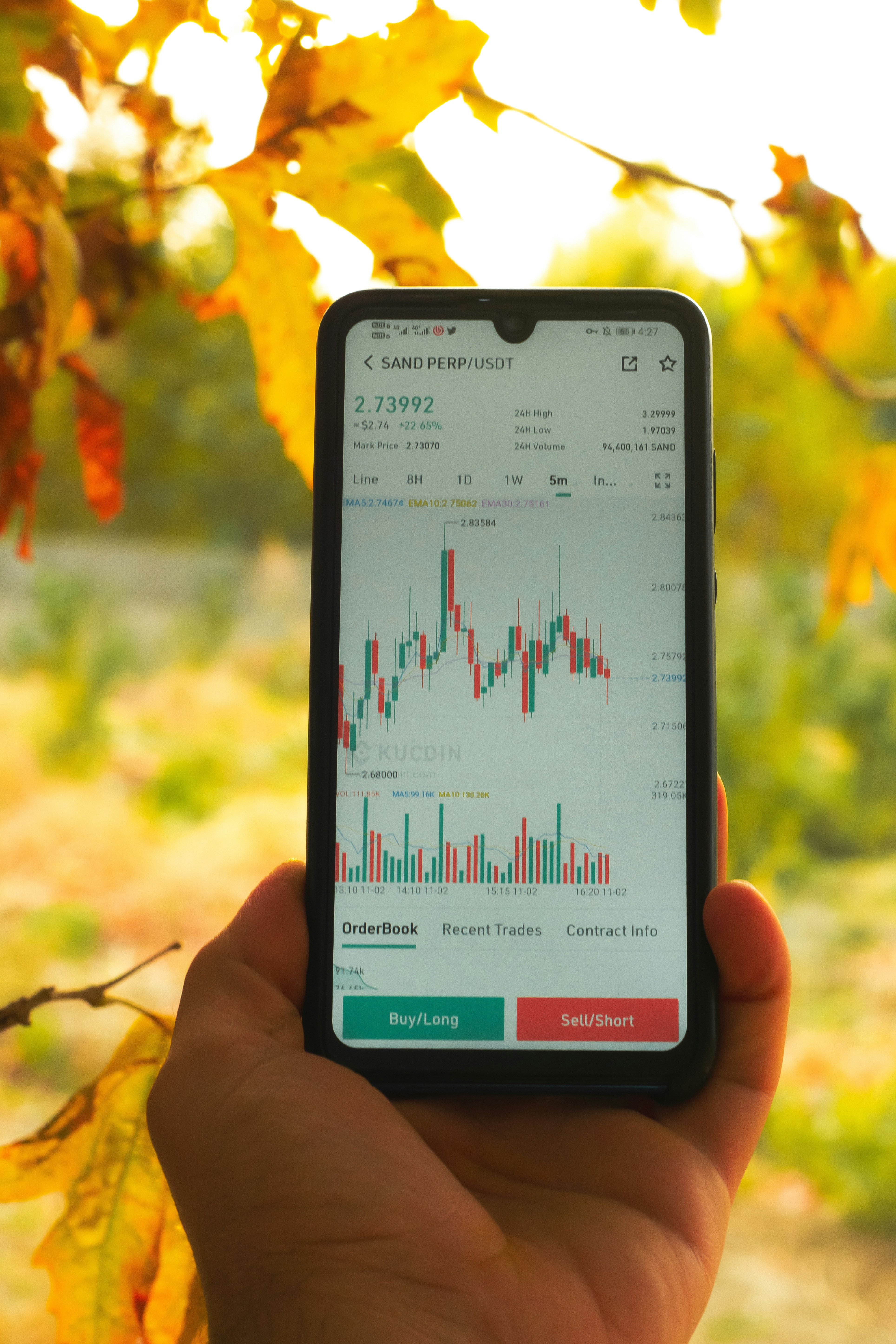 woman wearing yellow long-sleeved dress under white clouds and blue sky during daytime