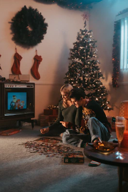 A cozy living room scene with a couple assembling a custom puzzle on a wooden table, surrounded by warm lighting.