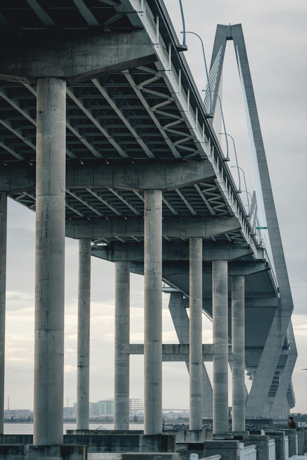 a very tall bridge over a large body of water