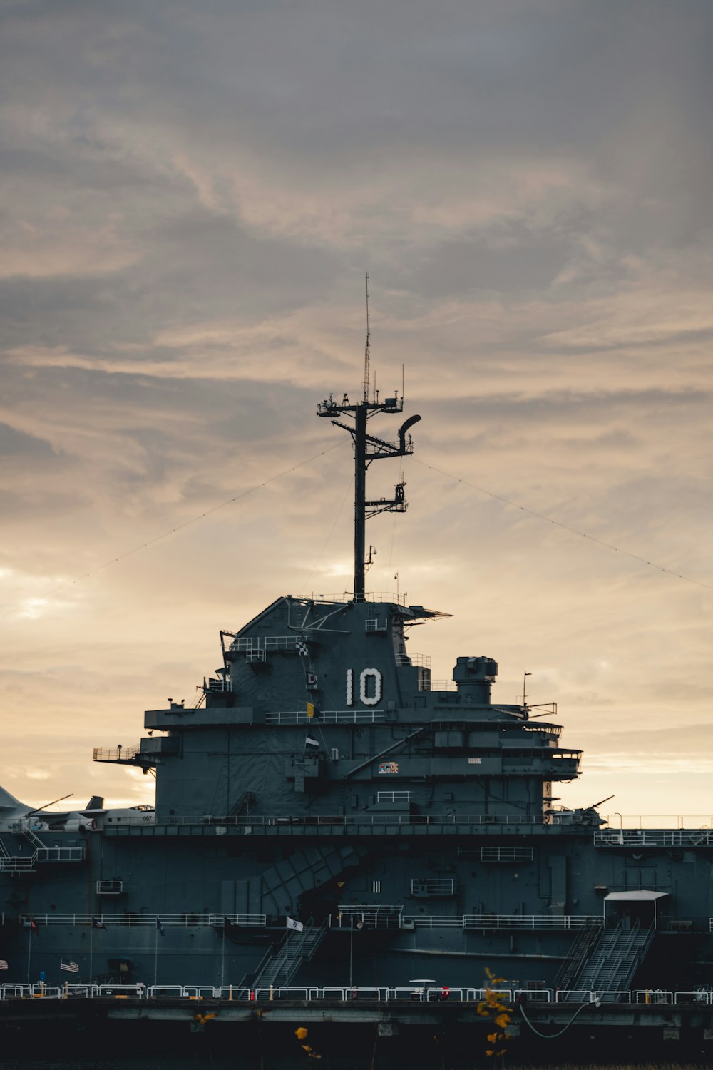 a large military ship sitting in the water