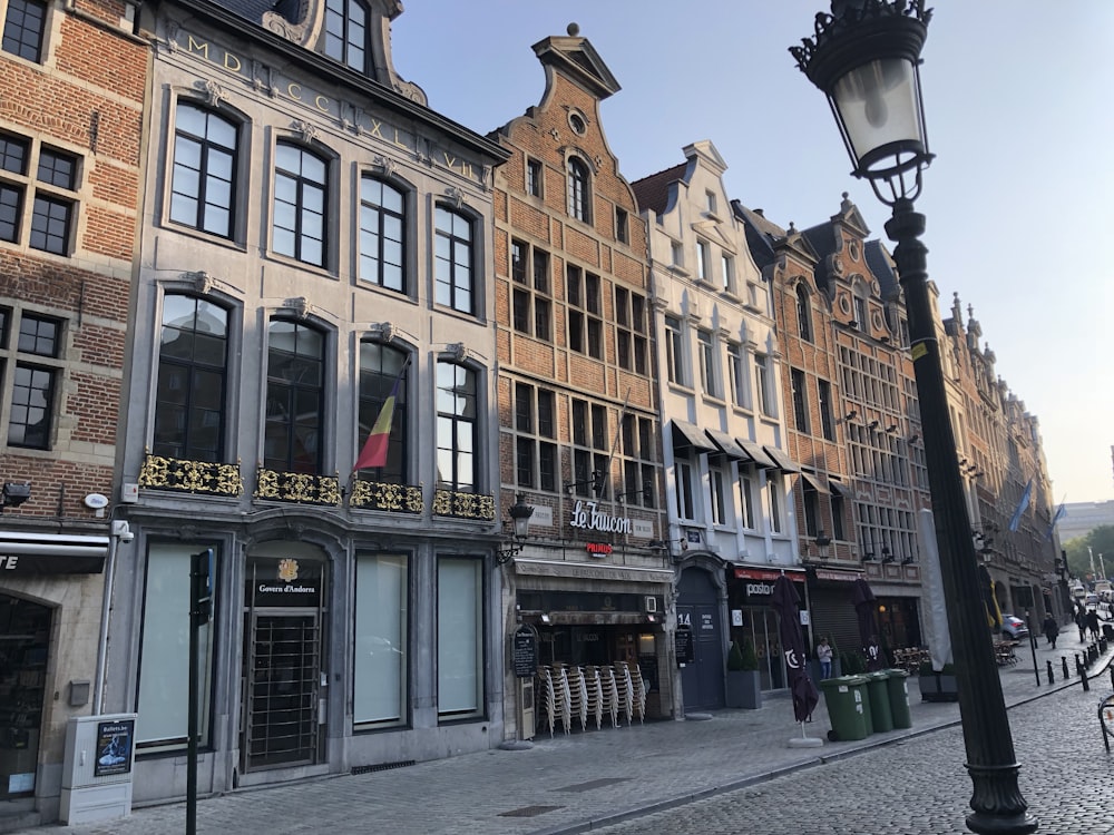 a row of buildings on a city street