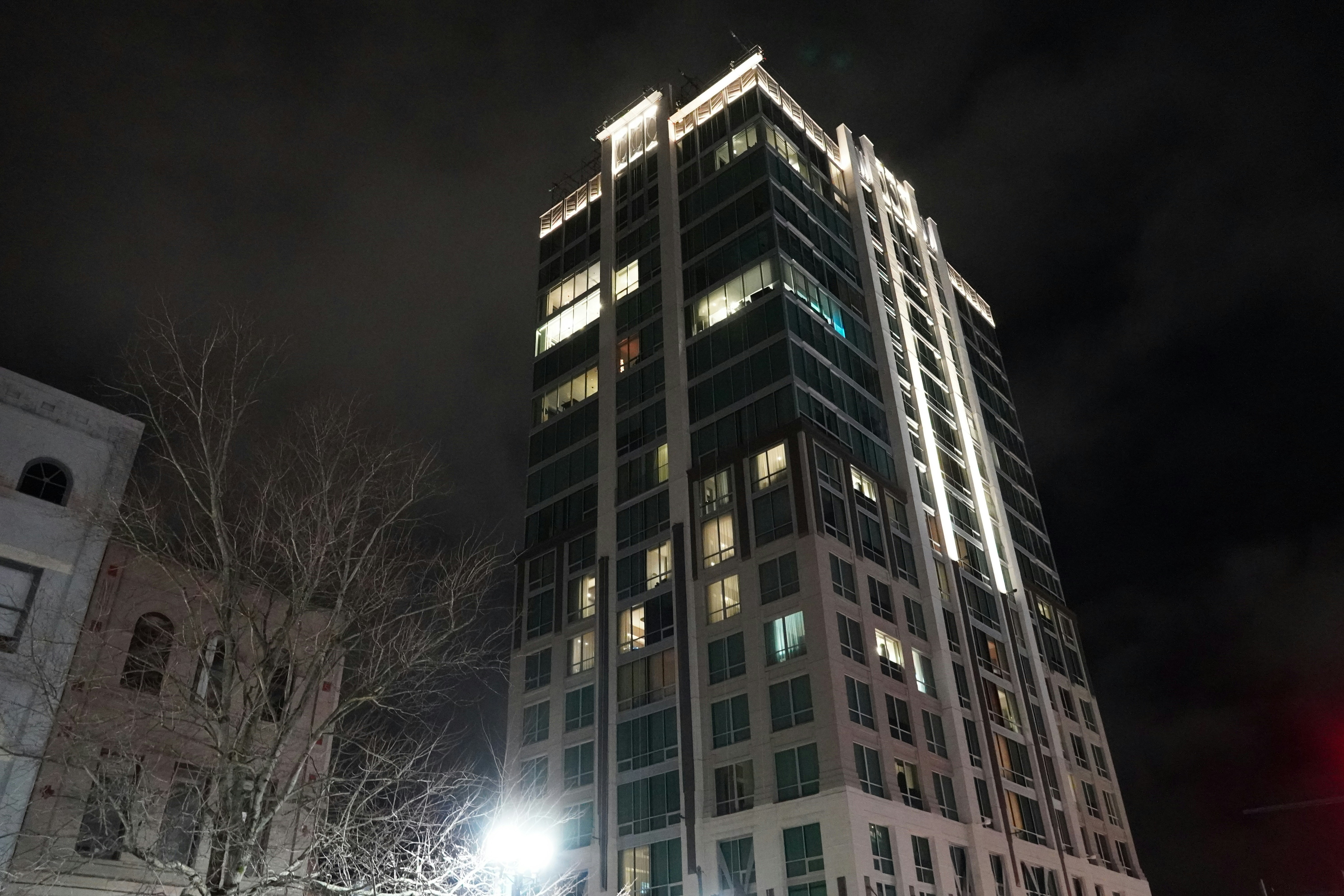 a very tall building lit up at night