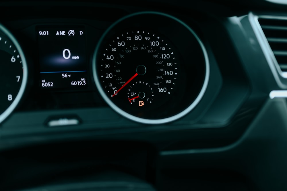 a close up of a speedometer in a car