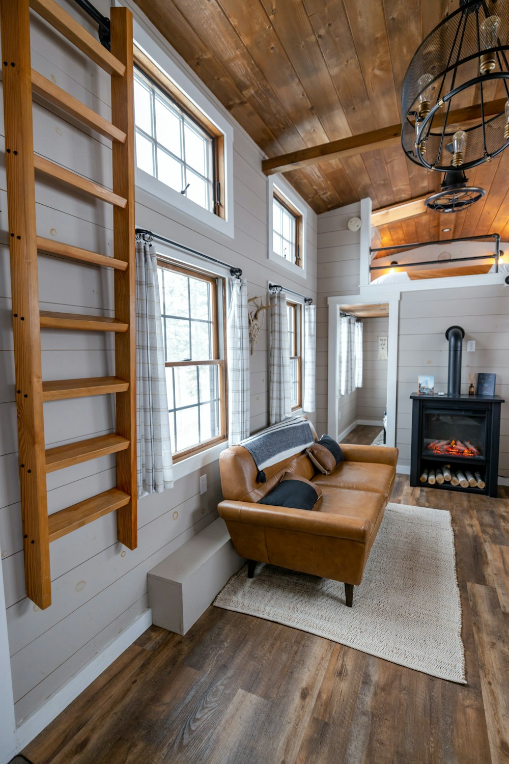 a living room with a couch and a fire place