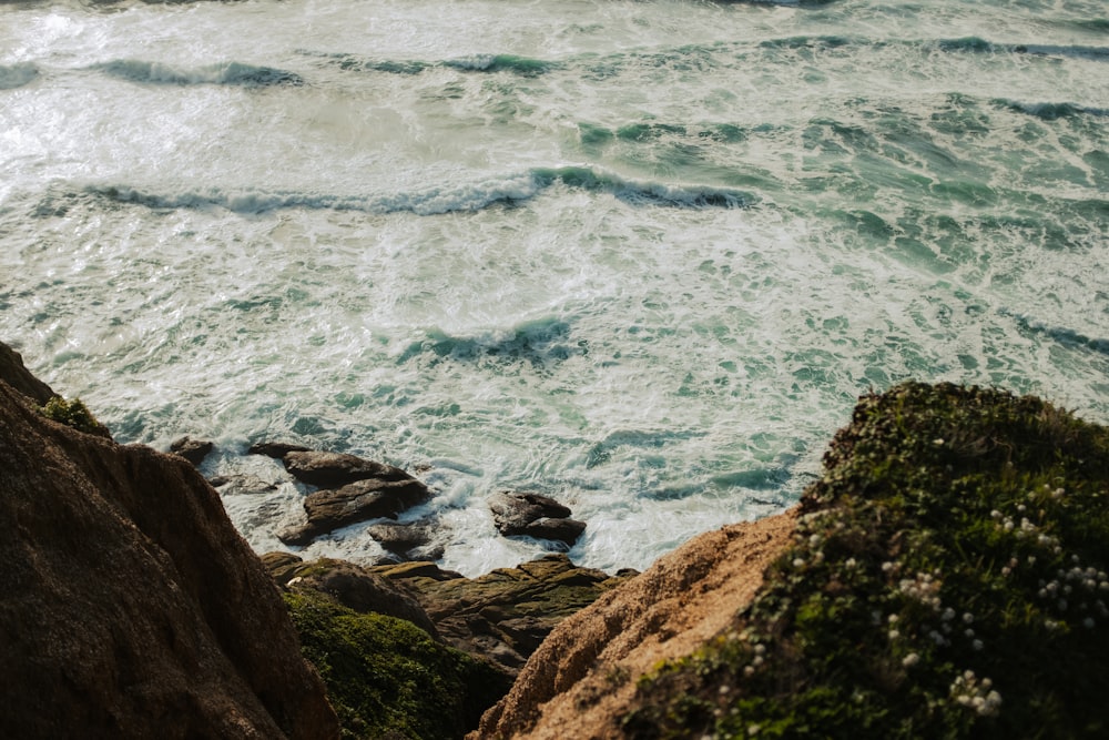 a view of a body of water from a cliff