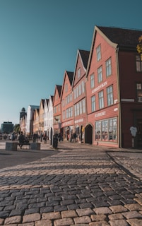 Historic German-style architecture lining a sunny pedestrian street in Qingdao’s old town.