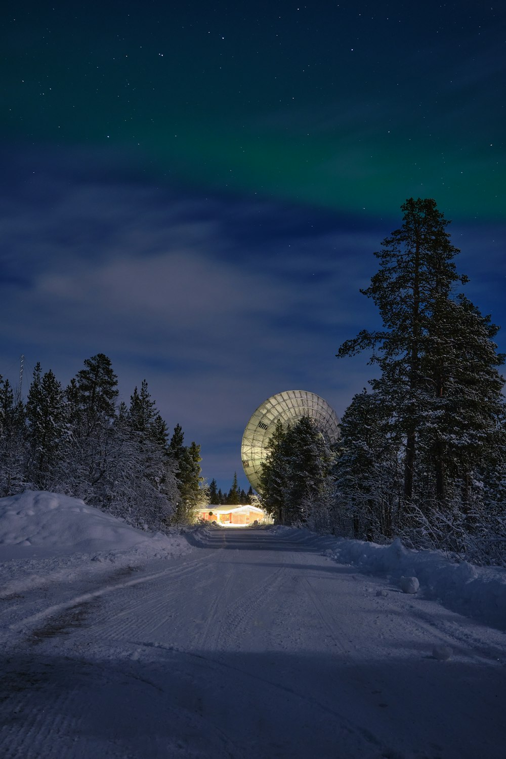 a road that has some snow on it