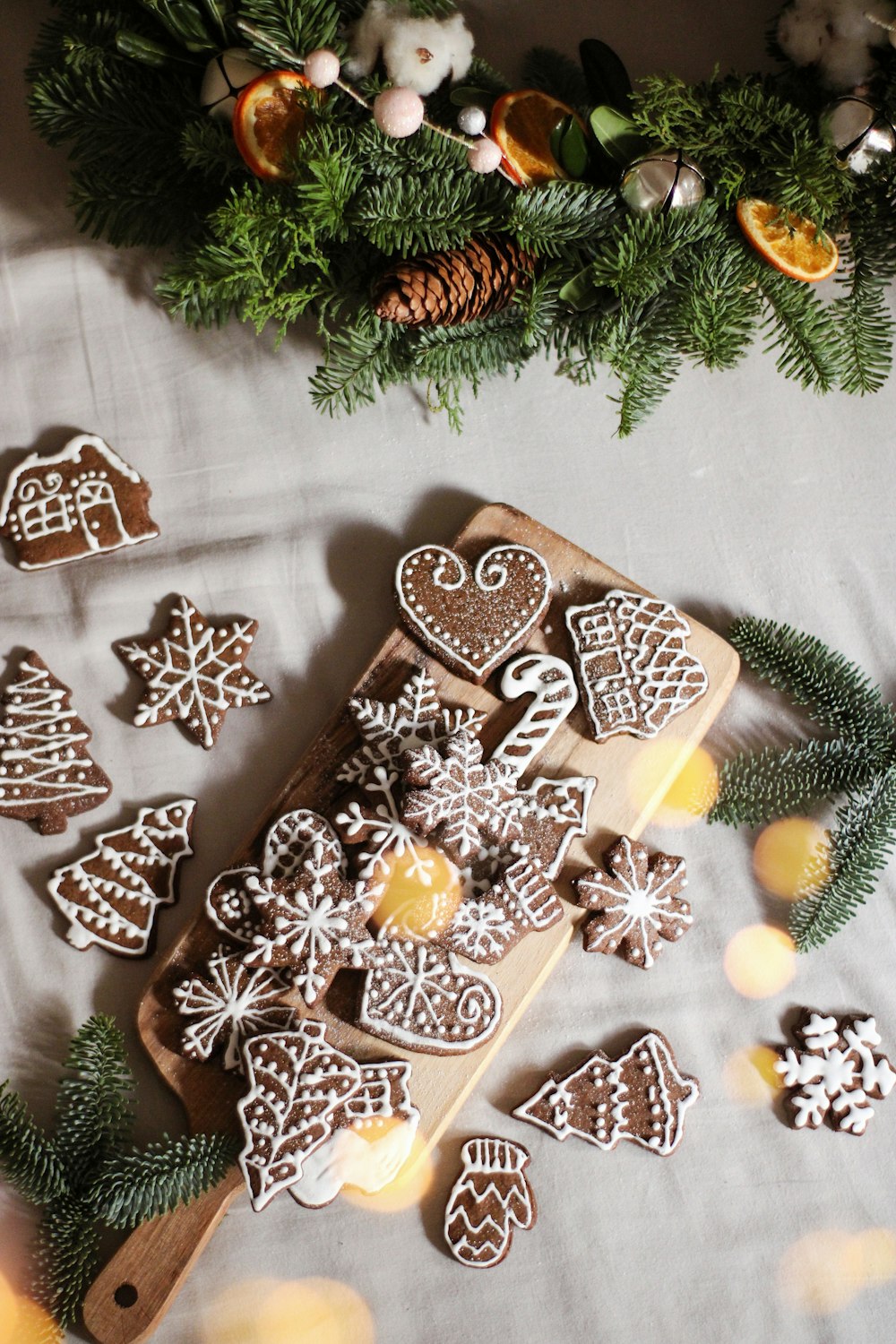 a table topped with lots of cut out cookies