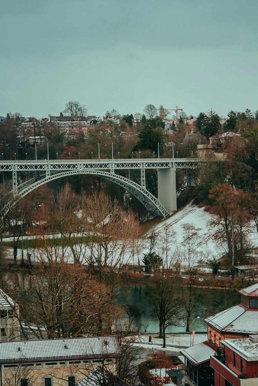 a bridge over a river in a city