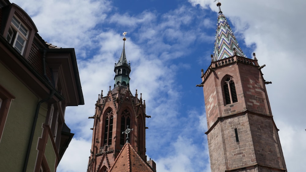 a tall tower with a clock on the top of it