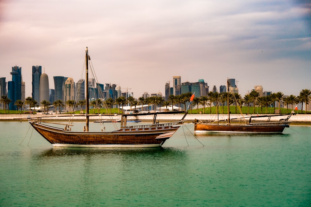 a couple of boats that are sitting in the water