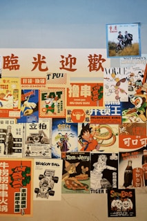 A collage of vintage and retro posters featuring various themes. The posters include advertisements with bold, colorful graphics and characters from popular media. Some posters have Chinese text, while others depict recognizable characters from cartoons and movies. The colors are vibrant, with a mix of warm and cool tones.