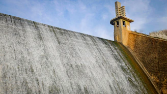 Detailed hydro power project model showcasing dam structure and water flow.