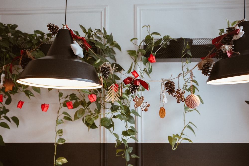 a couple of lights hanging from the side of a wall