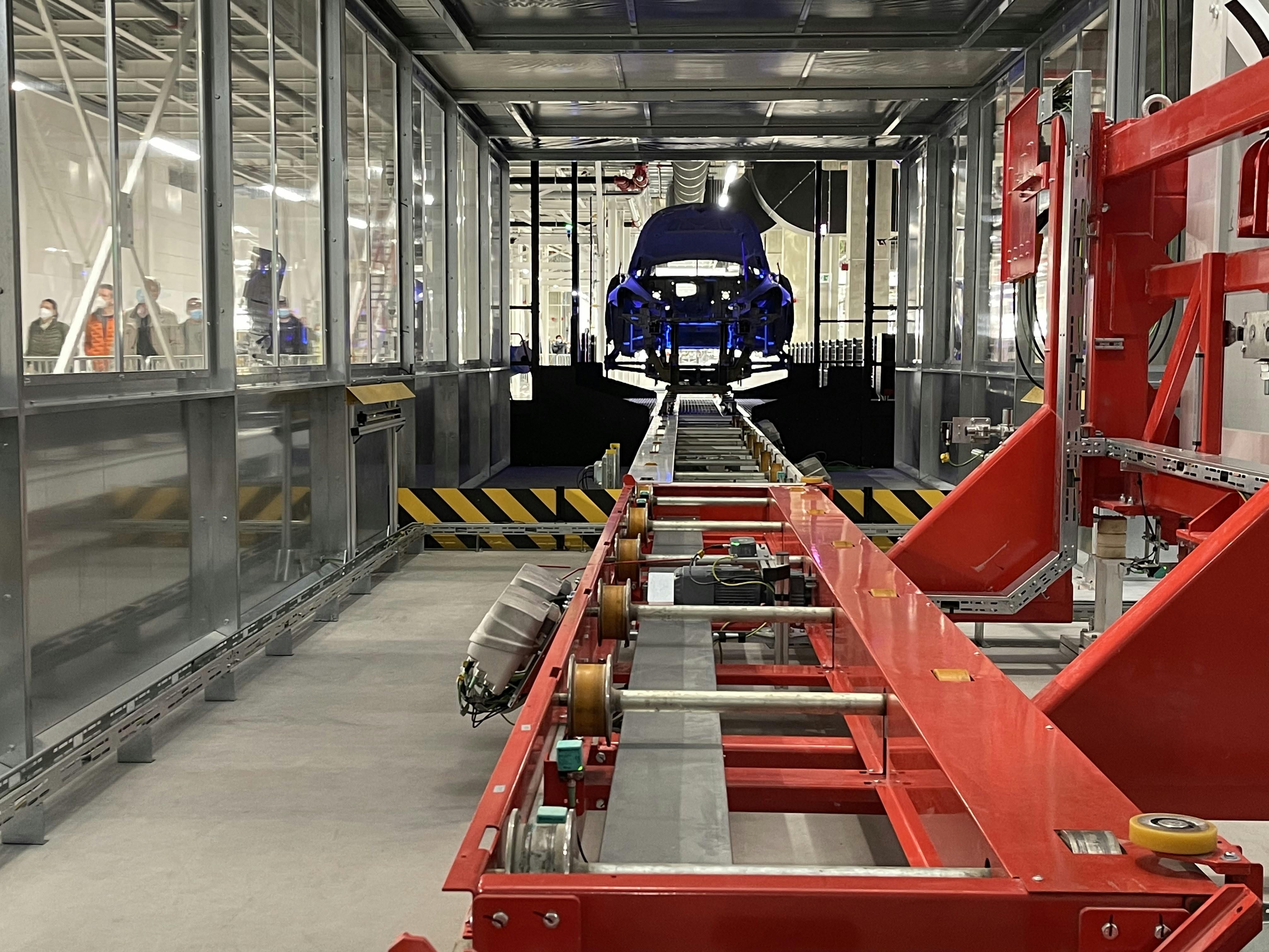 Tesla Gigafactory assembly floor with robotic arms