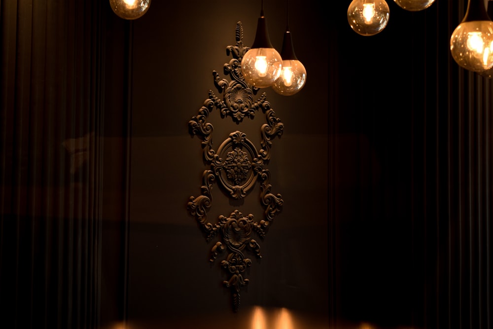 a chandelier hanging from the ceiling in a dark room