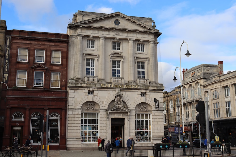 a group of people standing in front of a building