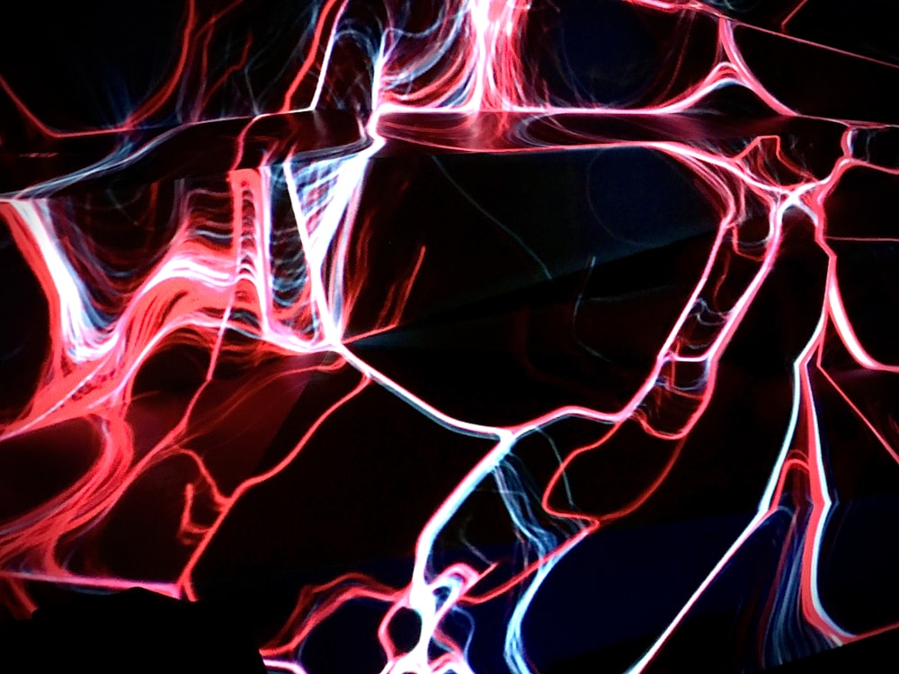 a black background with red and blue lines