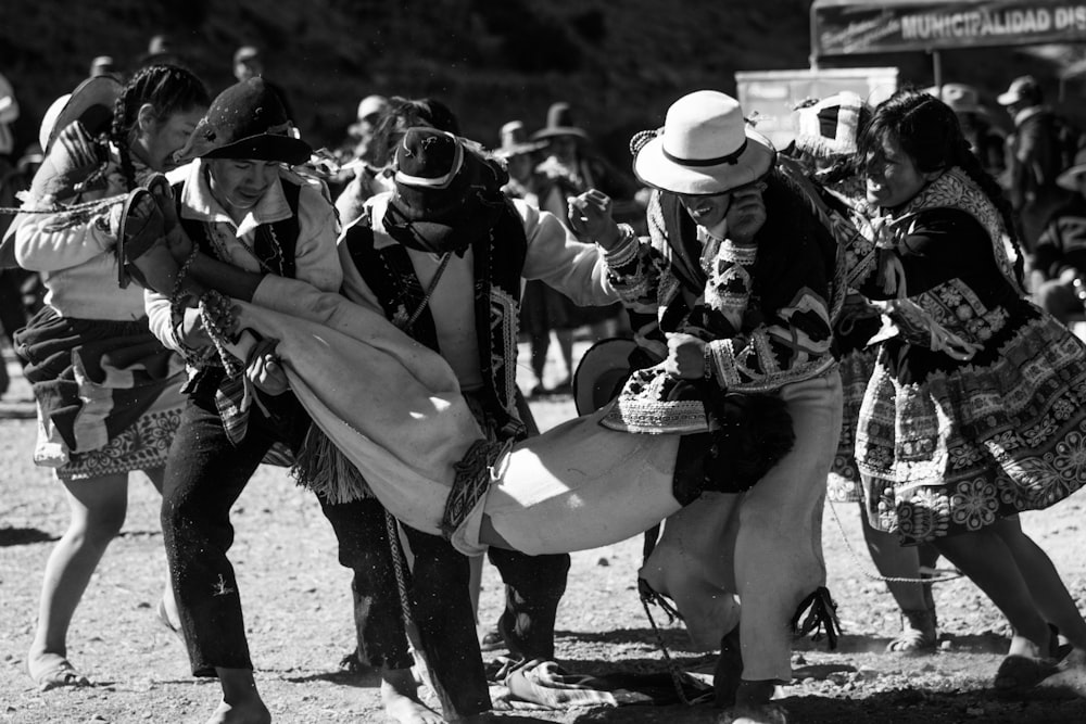 a black and white photo of a group of people