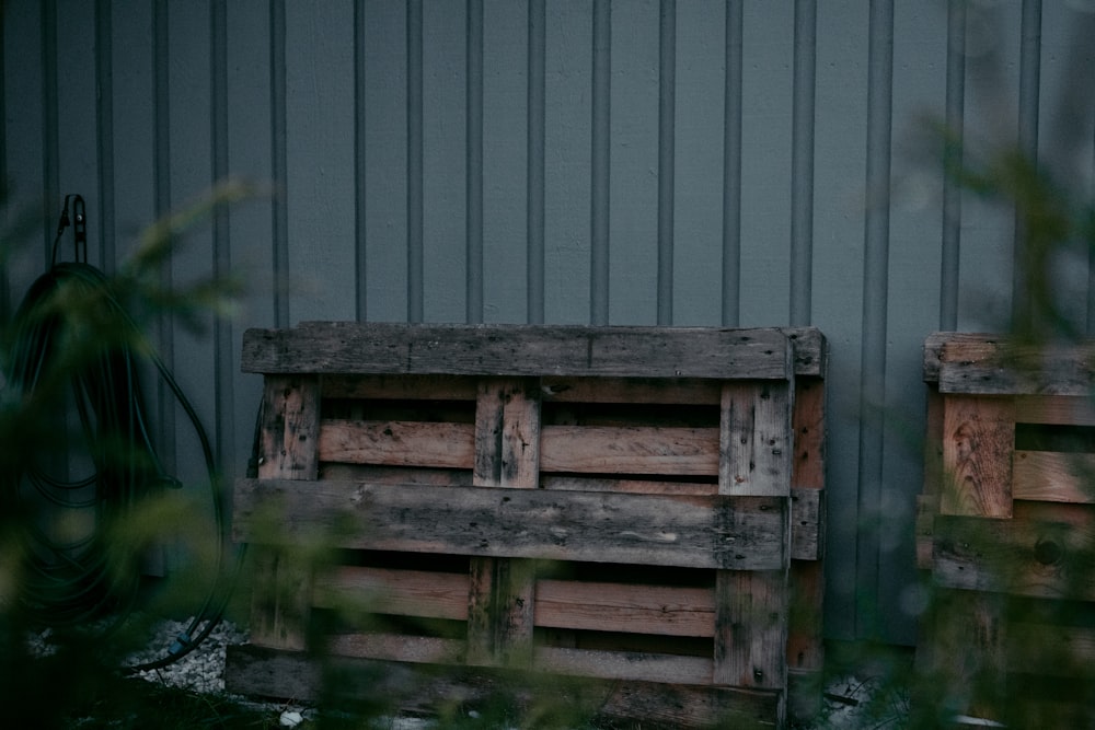 a couple of wooden crates sitting next to each other