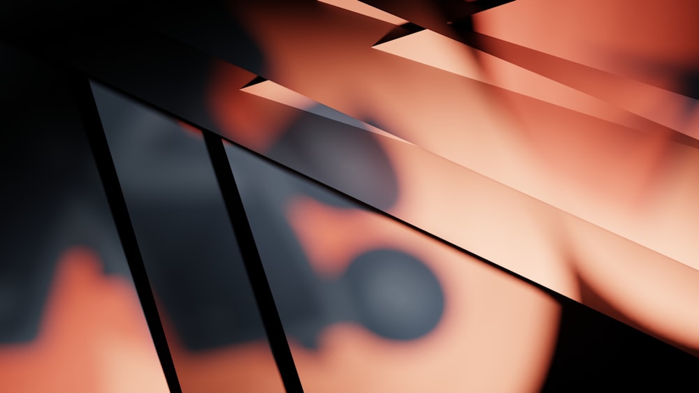 a blurry image of a black and orange background