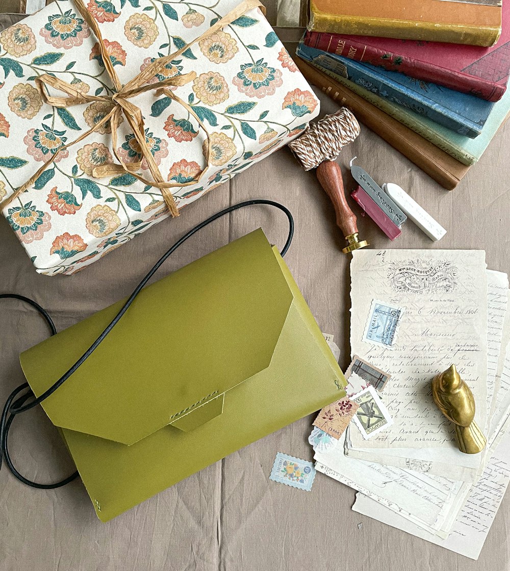 a table topped with lots of different types of envelopes