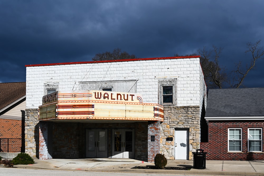 a building with a sign that says walnuts on it