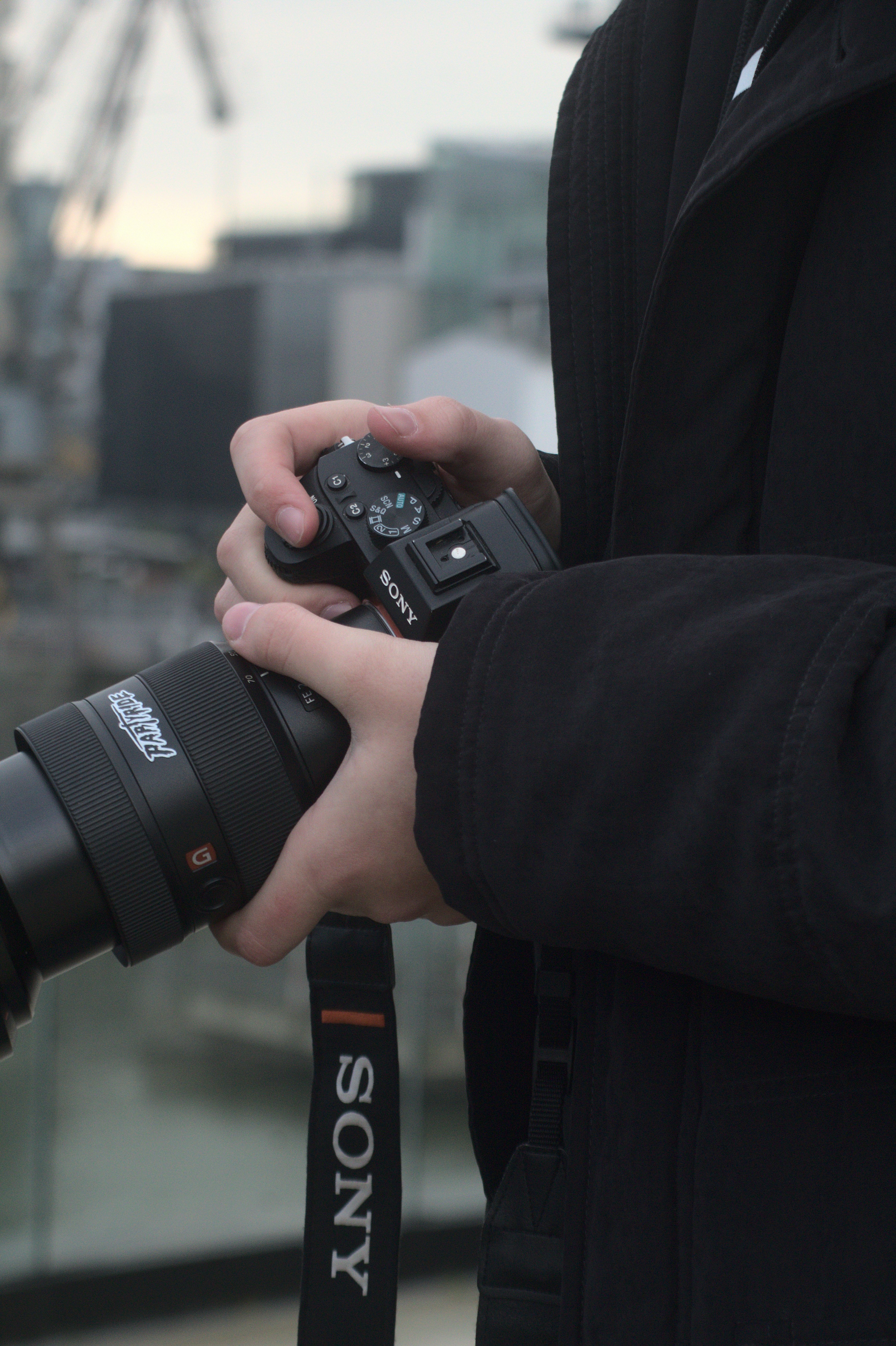 a person holding a camera in their hands