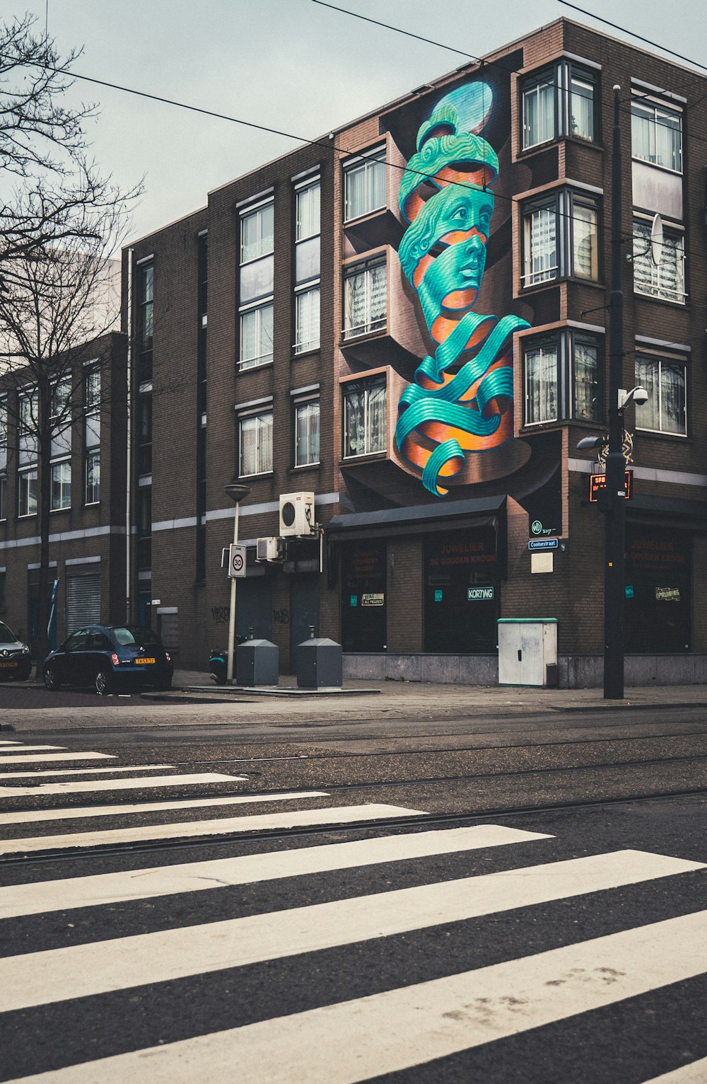 a large building with a mural on the side of it